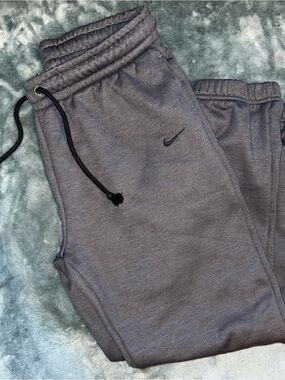 Nike women’s Dri-Fit Gray Fleece Jogger Pants